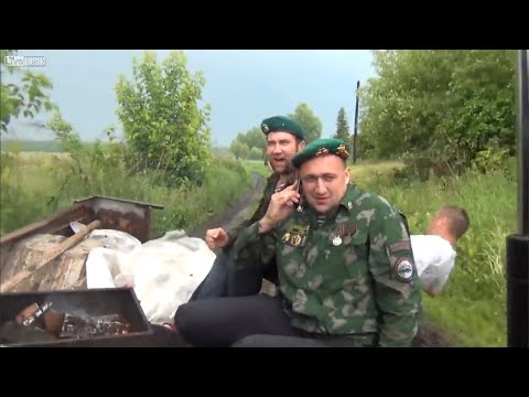Hilarious drunk Russians with a BBQ on a truck.