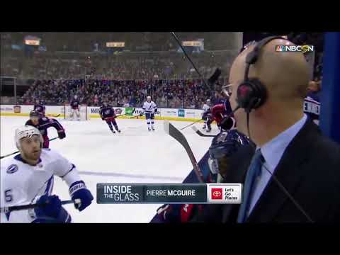 Flying puck almost hits NHL commentator in the head