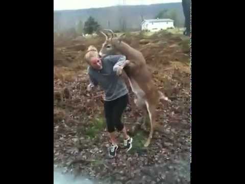 Young buck attempts to mate with blonde teen