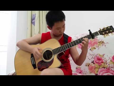 12 Year-Old Self-taught Chinese Guitar Prodigy Plays AC/DC&#039;s Thunderstruck