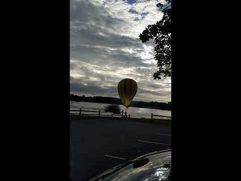 Hot Air Balloon Crashes into power lines and lake