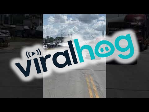 Train Cuts Through Wind Blade at Crossing || ViralHog