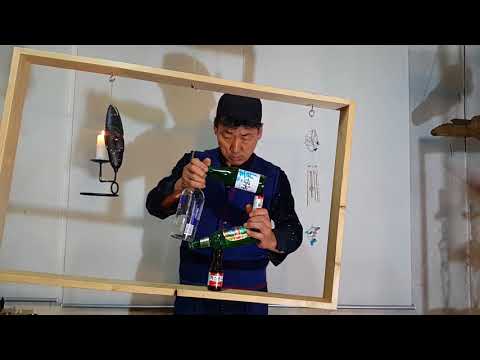RockyByun Balancing -making a square with bottles on the shaking frame