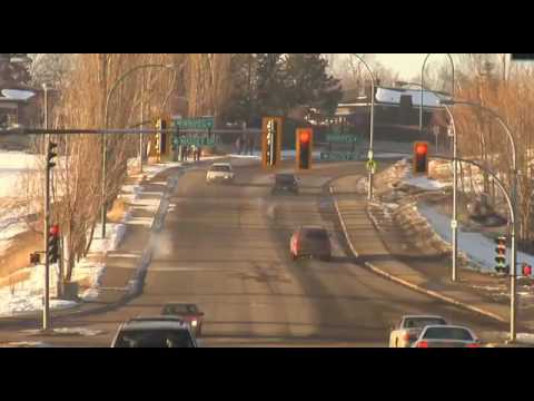Insane snowmobile jump gap over highway