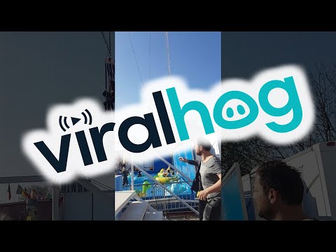 Woman Falls from Ride and Dangles by Feet || ViralHog