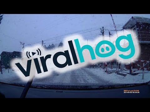 Boom Gates Open up as Train Passes || ViralHog