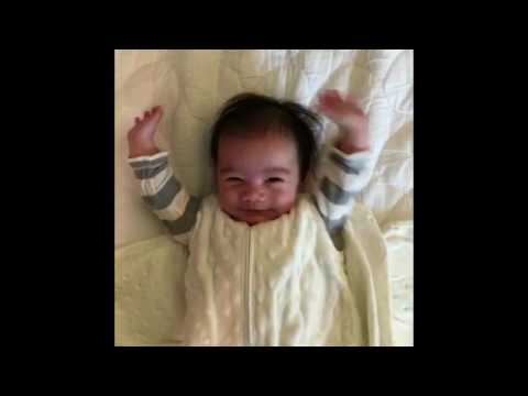 Cute baby throws his hands up after being unswaddled - KPtheBaby